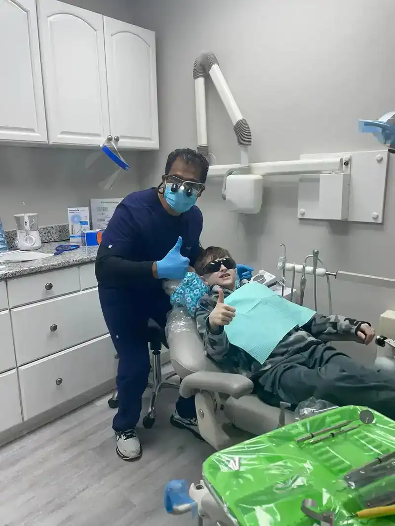 Dr. Gudipati with a patient